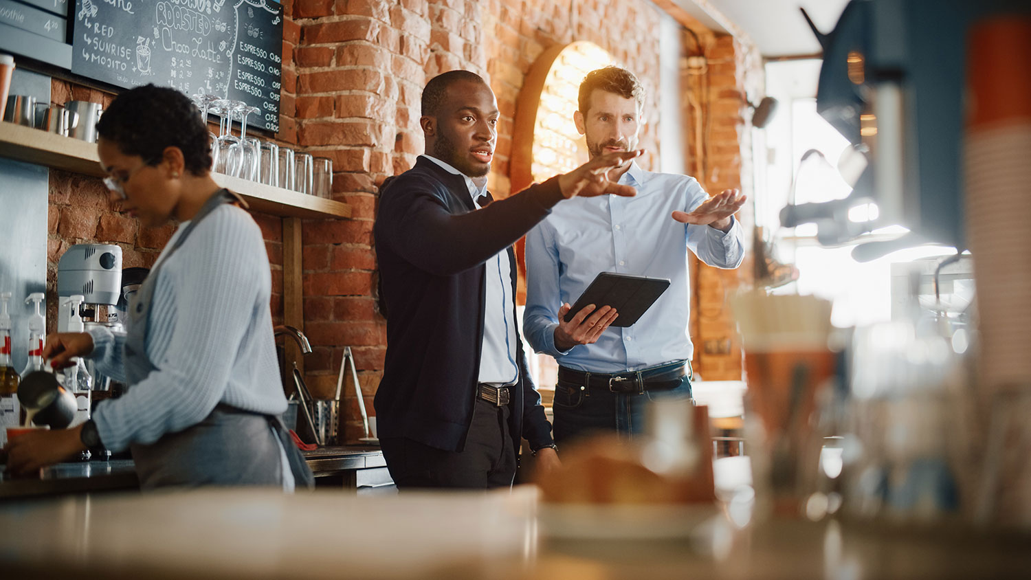 Vendor meeting with restaurant owner